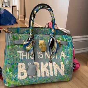 Stylish Gray Handbag with Artistic Design